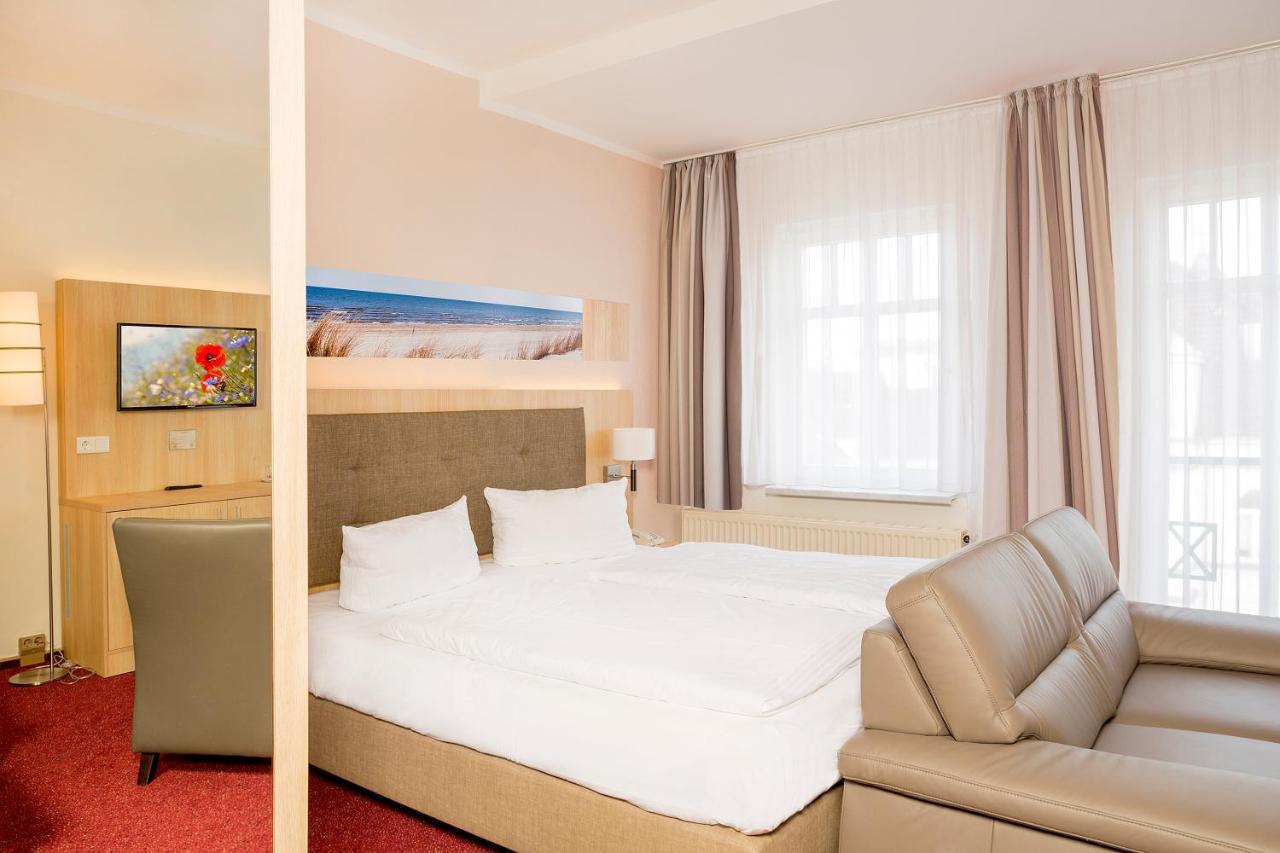 Garni Eden Hotels ゼーバート・ヘリングスドルフ エクステリア 写真