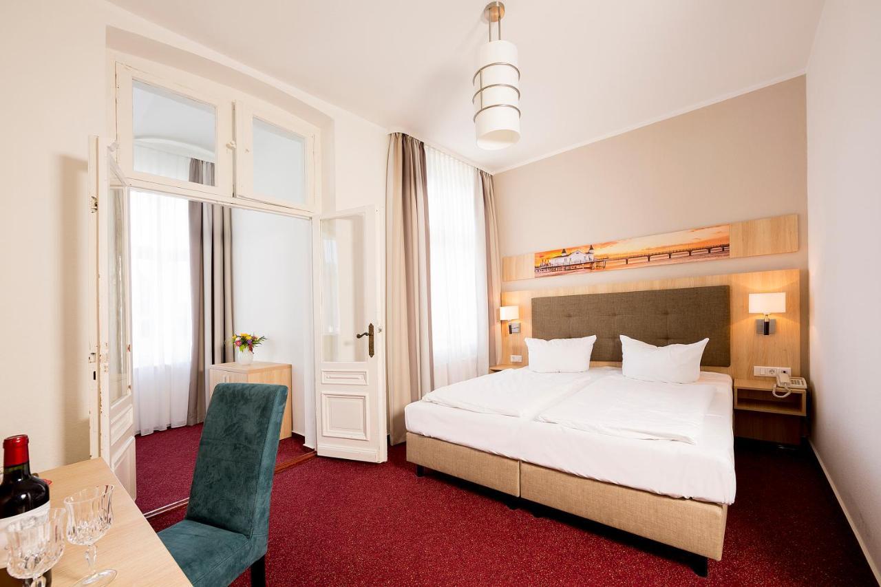 Garni Eden Hotels ゼーバート・ヘリングスドルフ エクステリア 写真